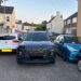 A Cambridgeshire Fire and Rescue Service emergency vehicle squeezes between tightly parked cars on Victoria Street in Fletton while crews respond to a house fire in Peterborough. PHOTO: Cambridgeshire Fire and Rescue