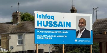 Campaign posters showing suspended candidate Ishfaq Hussain as the Conservative choice remained on display across Peterborough on polling day. Picture: CambsNews