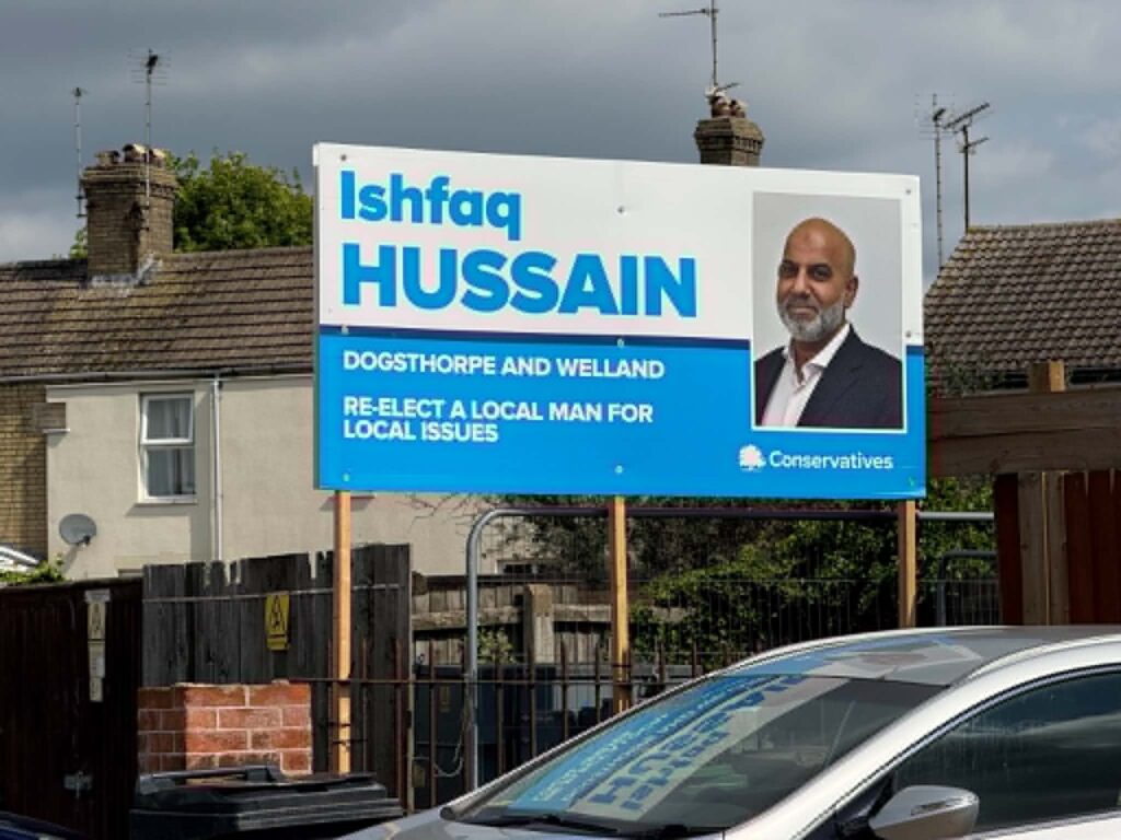 Campaign posters showing suspended candidate Ishfaq Hussain as the Conservative choice remained on display across Peterborough on polling day. Picture: CambsNews