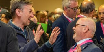 A slightly surreal moment from the Peterborough City Council election count as Labour MP Andrew Pakes ‘engages’ in a touch of ribaldry with Conservative party leader Cllr Wayne Fitzgerald. PHOTO: Terry Harris