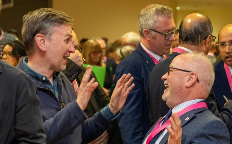 A slightly surreal moment from the Peterborough City Council election count as Labour MP Andrew Pakes ‘engages’ in a touch of ribaldry with Conservative party leader Cllr Wayne Fitzgerald. PHOTO: Terry Harris